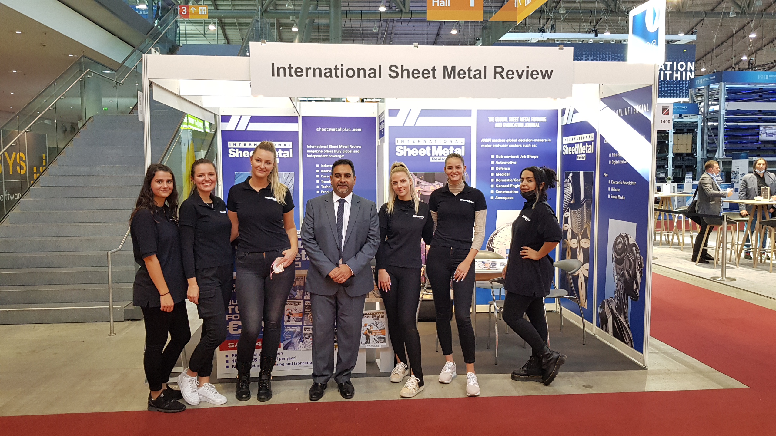 International Sheet Metal Review team on ISMR booth at Blechexpo 2021